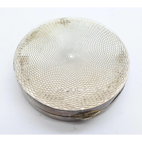 853 - A silver circular box with RAF sweetheart motif, 35g