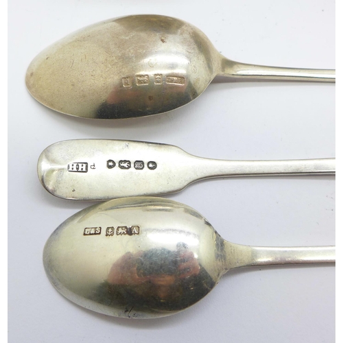 855 - Seven silver spoons, a pair of silver sugar bows and two silver napkin rings, 180g