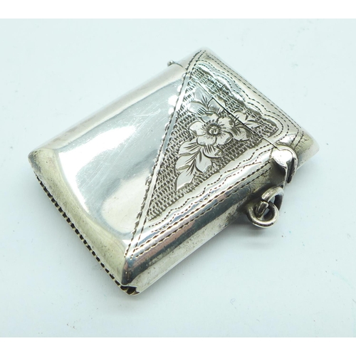 865 - A silver embossed vesta case, 21g