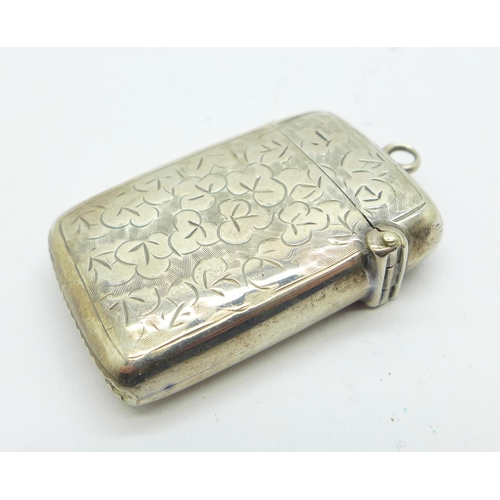 866 - A silver embossed vesta case, 15g