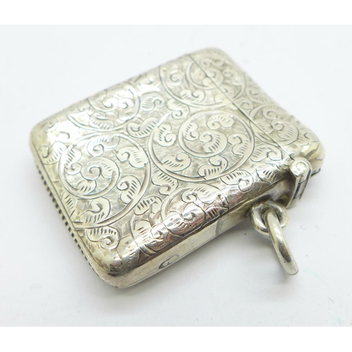 867 - A silver embossed vesta case with initials, 21g