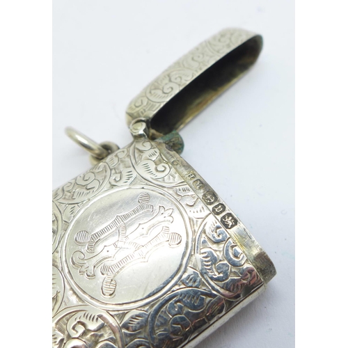 867 - A silver embossed vesta case with initials, 21g