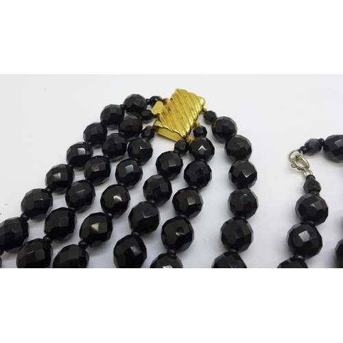 871 - Six black glass bead necklaces