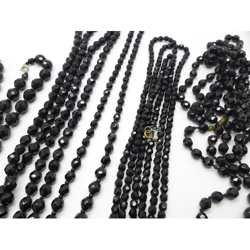 871 - Six black glass bead necklaces