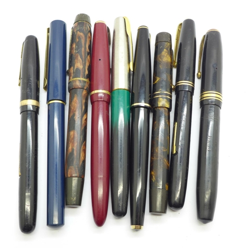 878 - Nine fountain pens, six with gold nibs including Waterman and Conway Stewart