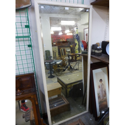 396 - An early 20th Century painted shop mirror