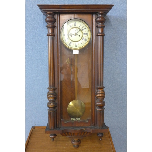 399 - A 19th Century mahogany Vienna wall clock