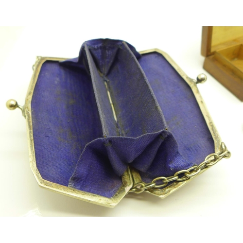 910 - An Art Nouveau plated purse, opera glasses, a treen stamp box, etc.