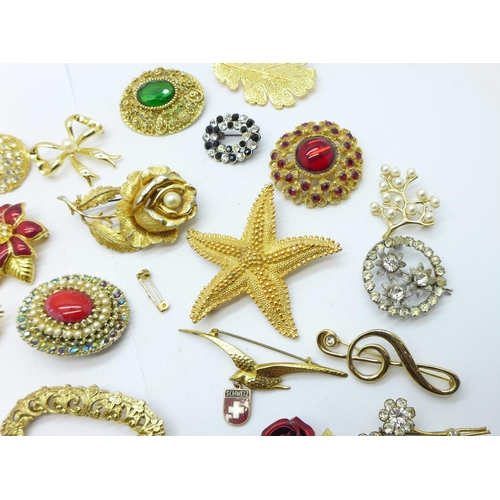 924 - Thirty costume brooches