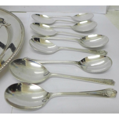 933 - Silver sugar tongs, 11.5g, a silver mounted fork and other plated ware