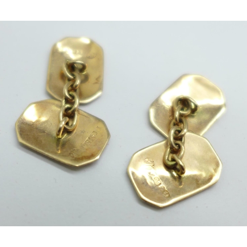 944 - A pair of 9ct gold cufflinks, 3.6g