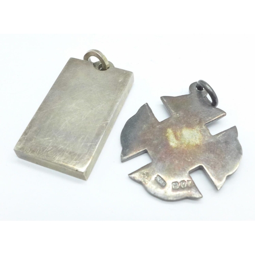 974 - A silver ingot, silver fob and an eternity ring (tests as silver and gold), 47.4g