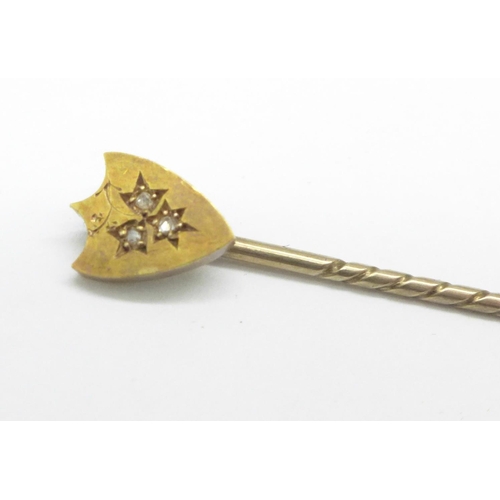 976 - An Edwardian 15ct gold and diamond stick pin, cased, 1.5g