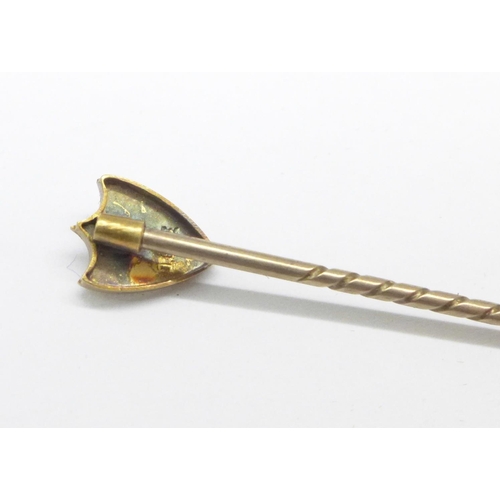 976 - An Edwardian 15ct gold and diamond stick pin, cased, 1.5g