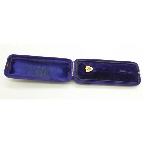 976 - An Edwardian 15ct gold and diamond stick pin, cased, 1.5g