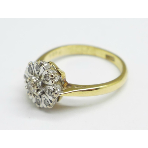 996 - An 18ct gold and diamond cluster ring, 3.9g, L