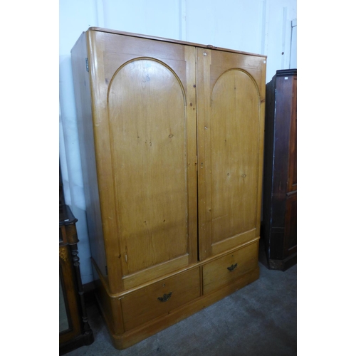 227a - A Victorian pine two door wardrobe