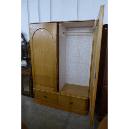 227a - A Victorian pine two door wardrobe