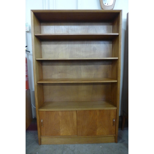 102 - A Herbert Gibbs teak open bookcase