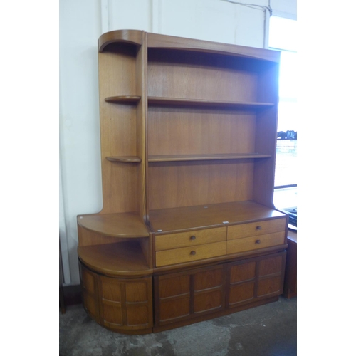 107 - A Nathan teak bookcase and matching corner cabinet