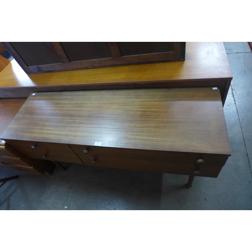 110 - A small teak sideboard