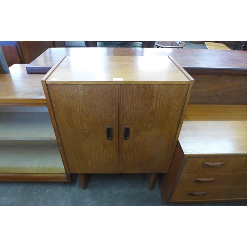 116 - A teak record cabinet