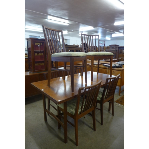 119 - A Vanson teak extending dining table and six chairs