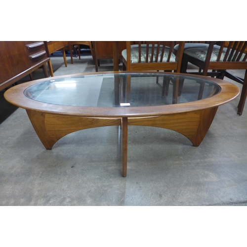 121 - A G-Plan Astro teak and glass topped oval coffee table