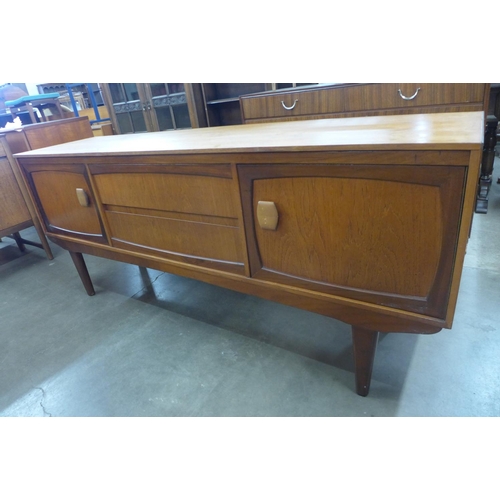 126 - A teak sideboard