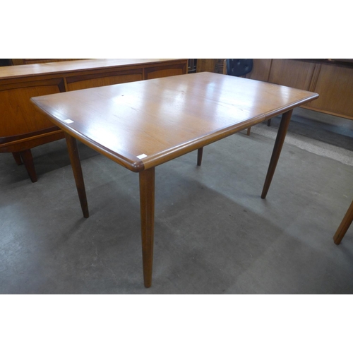 128 - A Meredew teak extending dining table