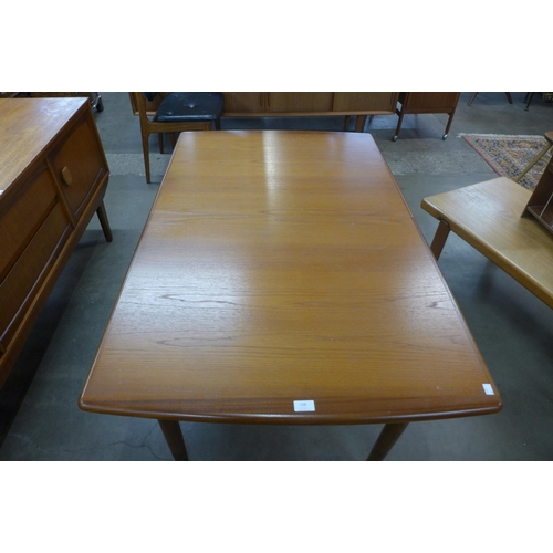 128 - A Meredew teak extending dining table