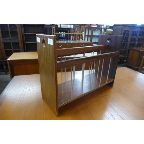 130 - A teak magazine rack