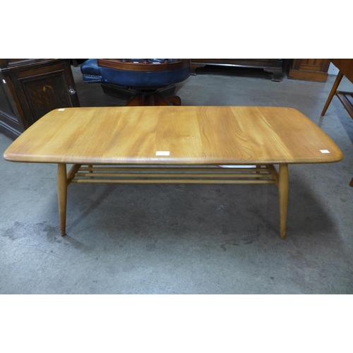 131 - An Ercol Blonde coffee table