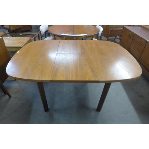 146 - A G-Plan teak extending dining table