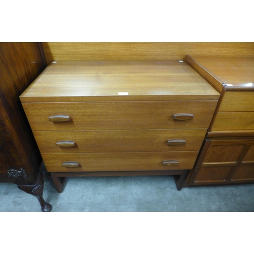 151 - A G-Plan Quadrille teak chest of drawers and a headboard