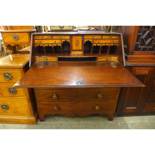 159 - A George III inlaid mahogany bureau