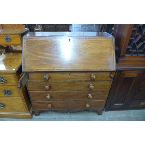 159 - A George III inlaid mahogany bureau