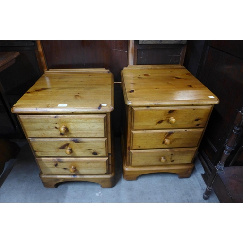 171 - A pair of Ducal pine bedside chests