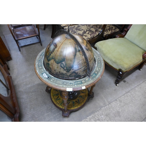 178 - A terrestrial globe cocktail cabinet, a/f