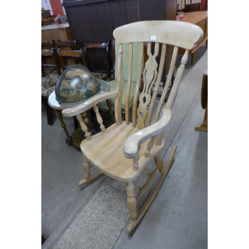 180 - A beech farmhouse rocking chair