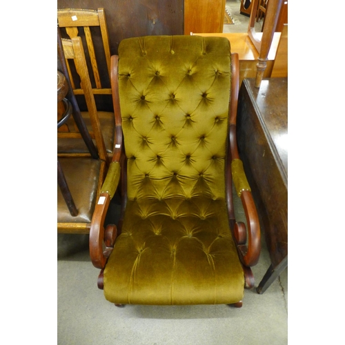 189 - A Victorian mahogany and upholstered open armchair