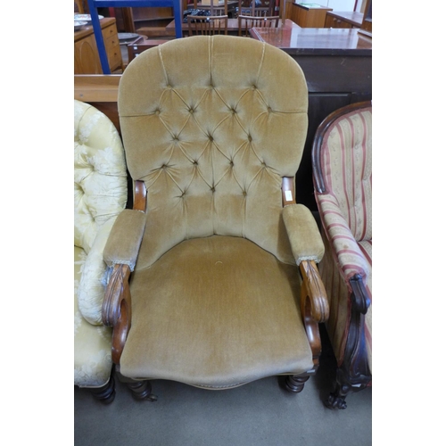 192 - A Victorian mahogany and upholstered open armchair