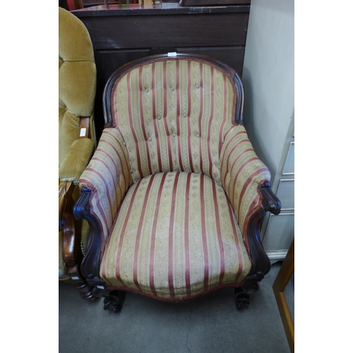 193 - A Victorian mahogany and upholstered armchair