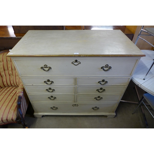 198 - A George III painted oak chest of drawers (top adapted to lift up)