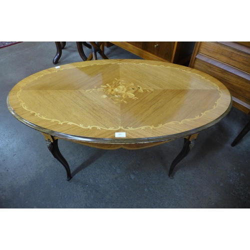 201 - An French style inlaid mahogany oval coffee table