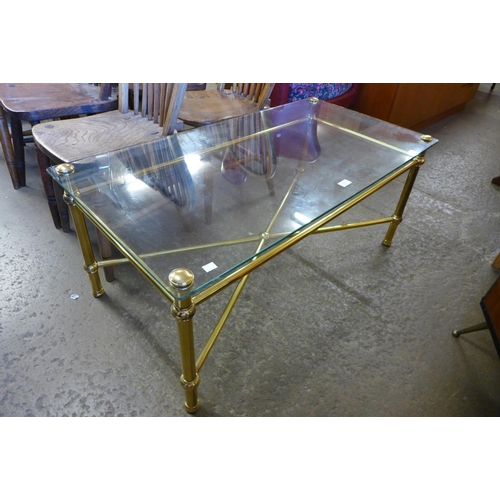 202 - An Italian style brass and glass topped rectangular coffee table