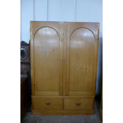 227a - A Victorian pine two door wardrobe