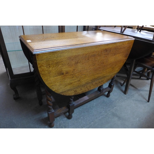 230 - An oak barleytwist gateleg table