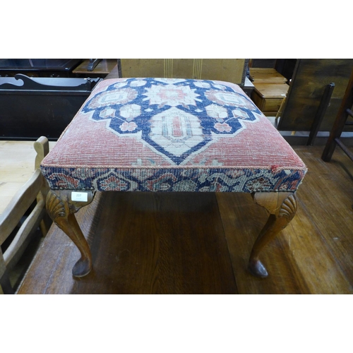 237 - A Queen Anne style walnut footstool