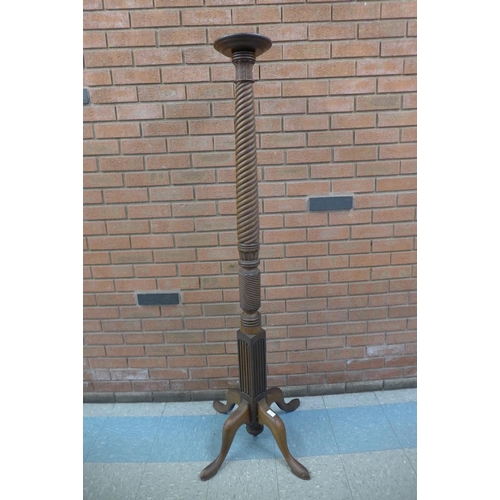 245 - A Hepplewhite Revival mahogany torchere